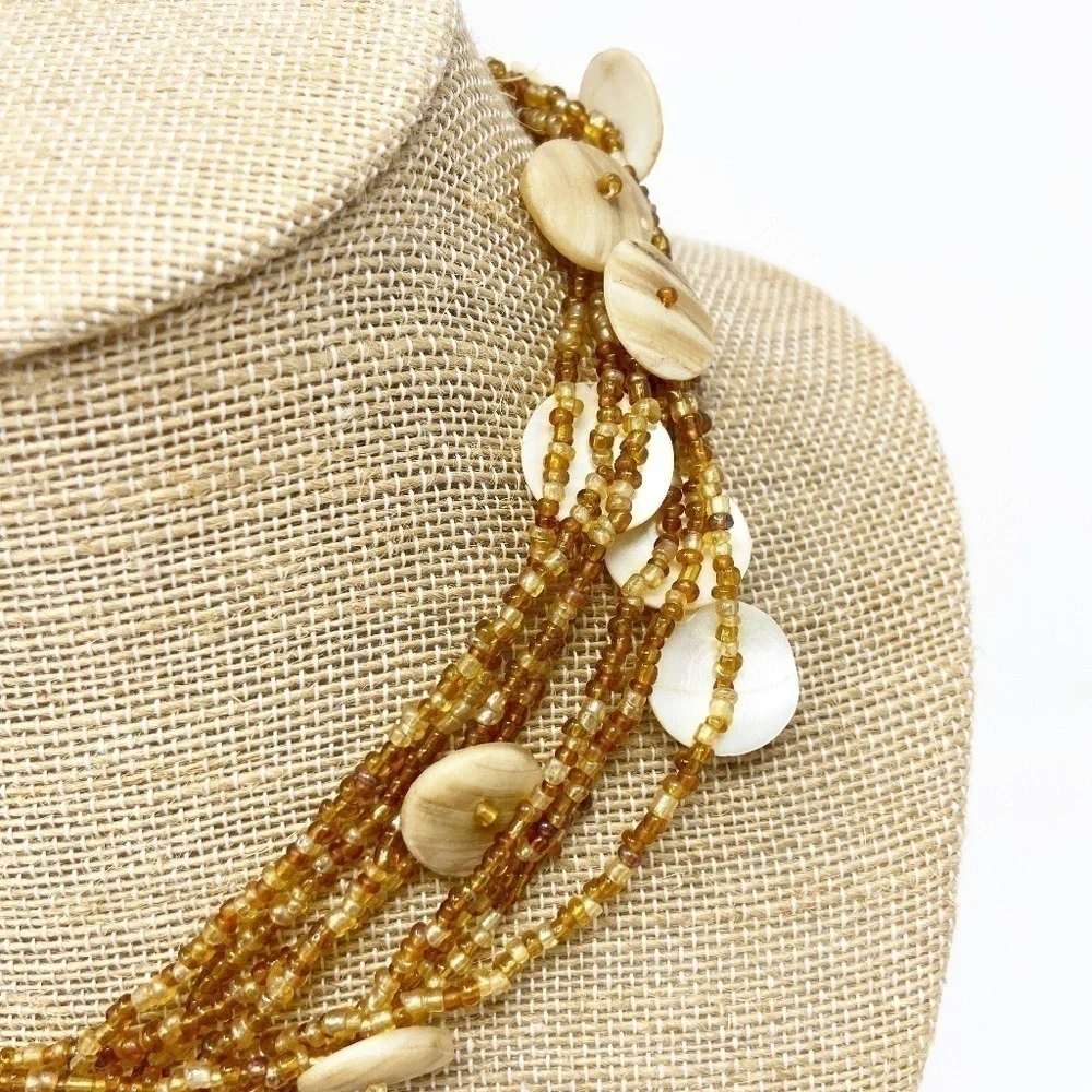 8 Strands of Brown & Amber Beaded Necklace